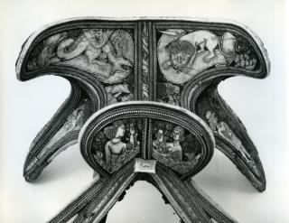 Saddle with reliefs (selle; appliqués) (Back)