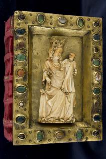 Relief (appliqué); used as part of the binding of a book (Front)