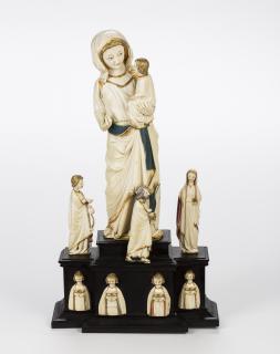 Reliefs (appliqués; part of a group) and statuette (Front)