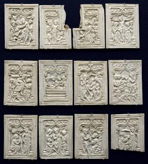 12 panels (fragments of a box), 1 register, 1 ogee arch across (plaquettes) (Group, front)