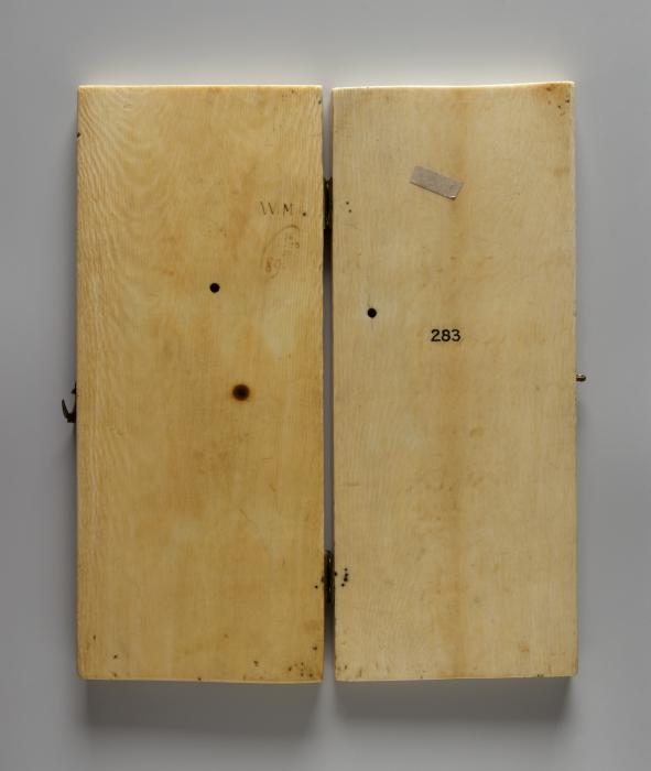 Diptych, 3 registers, 2 full and a half arches across (colonnettes; frise d'arcatures) (Back)