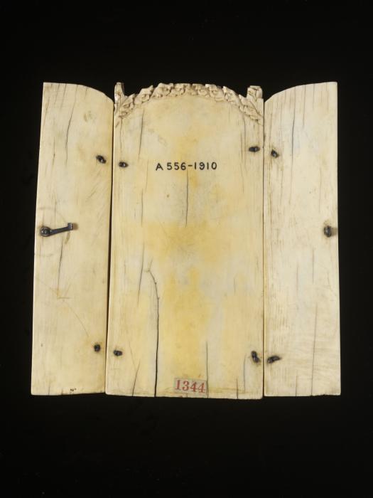Rounded-top triptych (originally gabled triptych), 2 registers, 2 arches across and 3 arches across (frise d'arcatures; colonnettes) (Back, open)