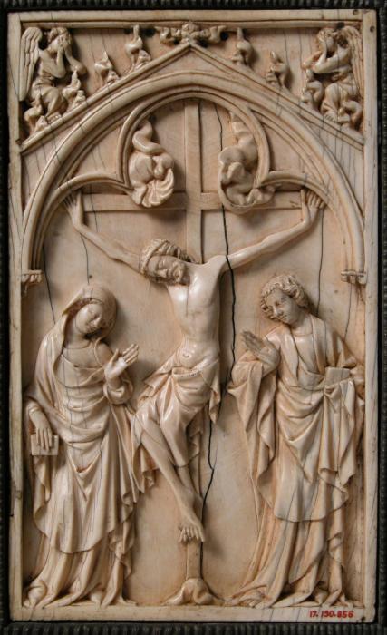 Wing, right (fragment of a diptych), 1 register, 1 arch across (plaquette), reused as part of the binding of a book (Front)