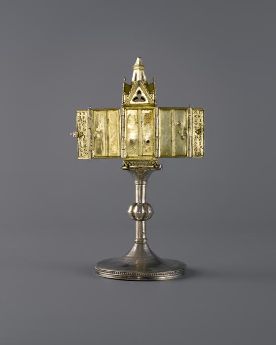 Statuette; inserted in a winged tabernacle (Back)