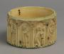 Cylindrical pyxis, with arches and rosettes (pyxide; frise d'arcatures; décor de roses; colonnettes) (Side)
