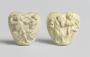 Heart-shaped plaques (fragments of scabbards)